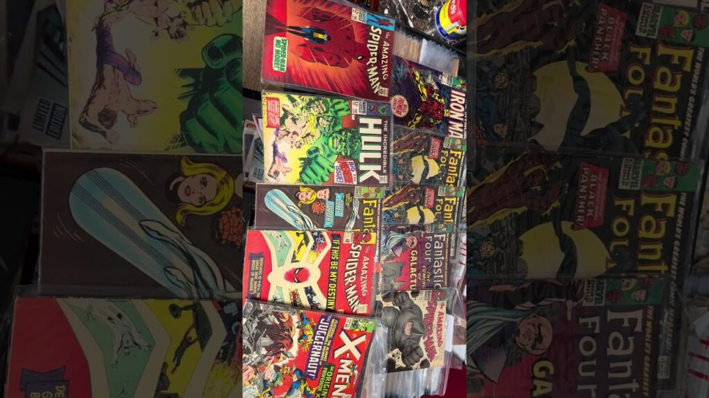 Silver Age Marvel comic books including Amazing Spider-Man, Incredible Hulk, Iron Man, Fantastic Four and X-Men laid out in rows