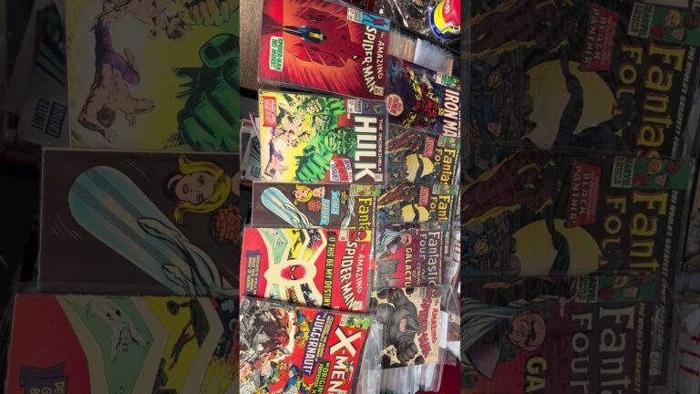 Silver Age Marvel comic books including Amazing Spider-Man, Incredible Hulk, Iron Man, Fantastic Four and X-Men laid out in rows